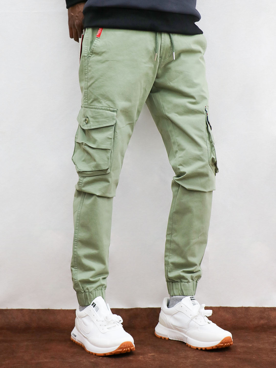 CARGO LIGHT GREEN PANTS WITH RUBBER. | Instagram