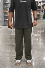 Load image into Gallery viewer, Men’s Street Baggy Pants with White Stripe - Mahendhi Green-7 Man
